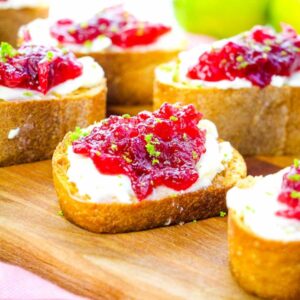 close up of cranberry crostini garnished with lime zest