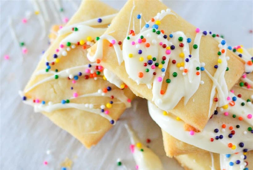 A small stack of decorated shortbread cookies.