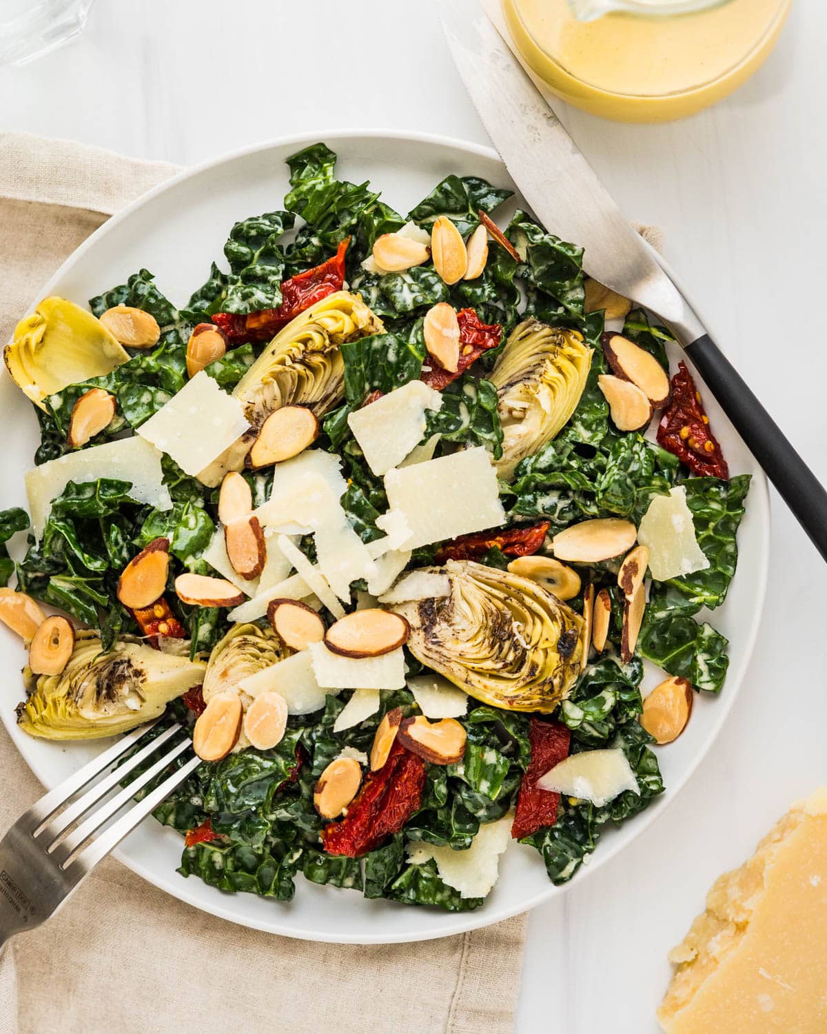 A salad made with kale, artichokes and cheese.
