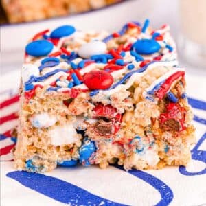 red, white and blue rice krispie treat on a swirled napking