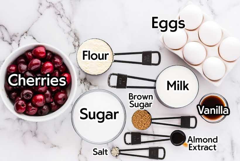 Ingredients to make cherry clafouti with labels.