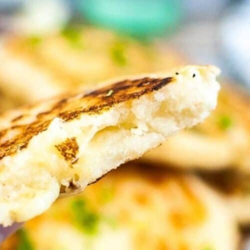 a plate of cheesy fry bread.