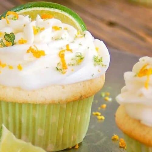 A cupcake with a lime edge on top.