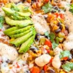 A vegan taco bowl with avocado, beans and salsa.