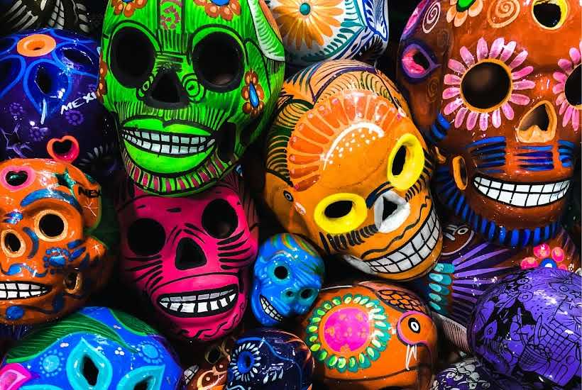 Colorful skull masks for party decorations.