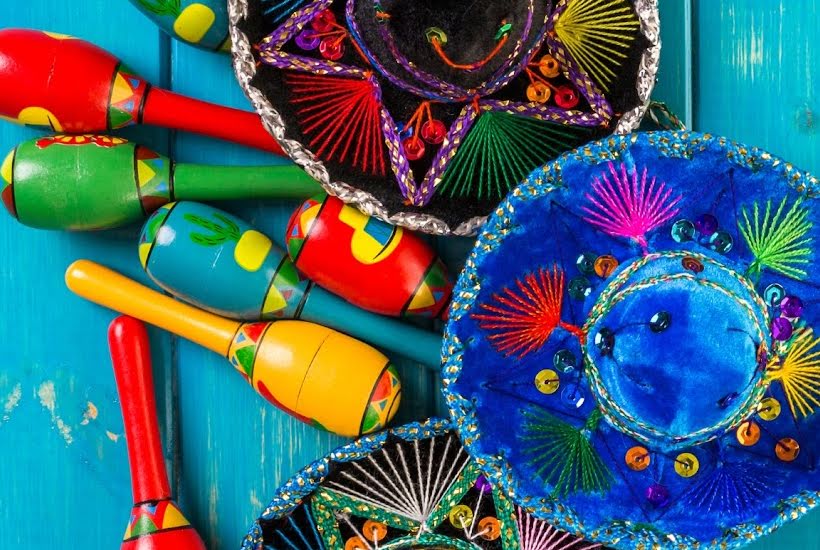 Colorful maracas and sombreros decorations for taco fiesta.