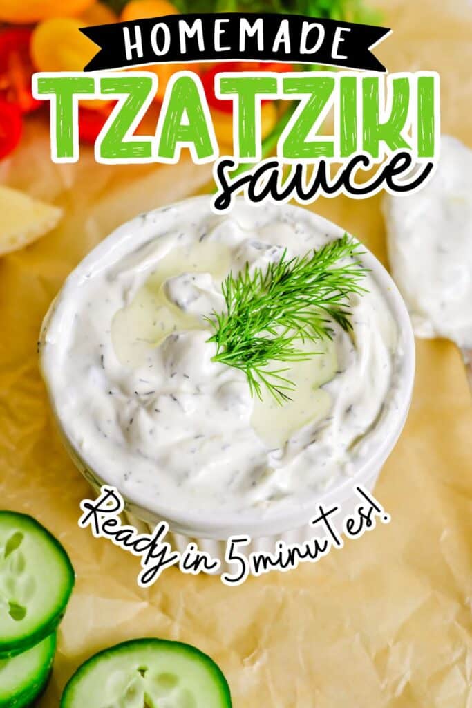 Bowl of creamy tzatziki sauce garnished with fresh dill on a a piece of parchment paper with sliced cucumbers and graphic text overlay.